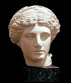 Head of Apollo, 2d Century AD. Collection Lombry. The sculpture represent the etalon of Greek profile. The lines are pure and the surface smooth. The abundant and round-styled hair contrasts with the oval, elongated face.