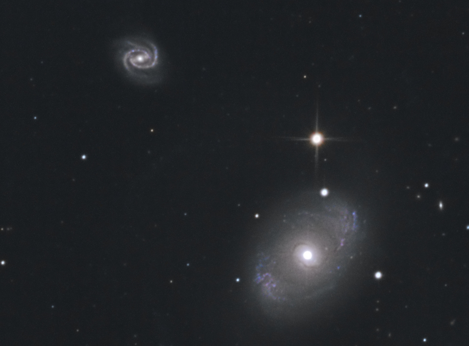 NGC_4151_et_4156.jpg.718df9a4714c2755846575217063102a.jpg