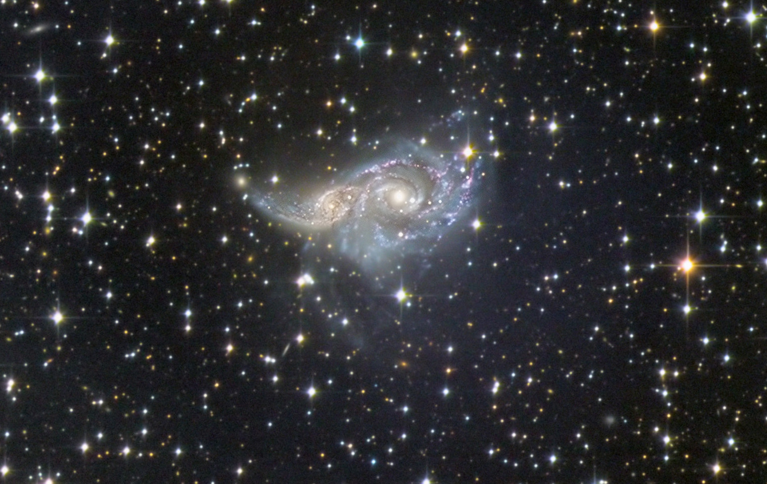 604911dee3fa9_NGC2207crop.jpg.d6d1e240071d9ac9efd0c340f6e9b80c.jpg